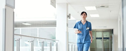 Nurse walking the halls of the hospital