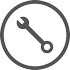 A black and white circle featuring a wrench.