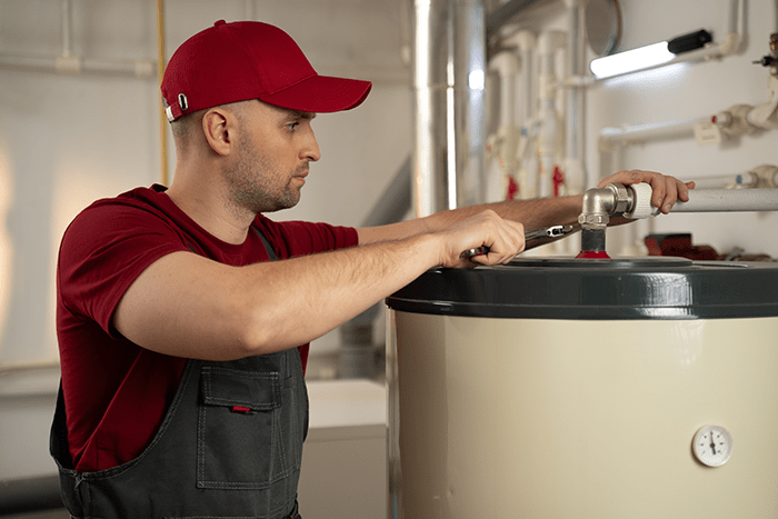 Technician working on a boiler