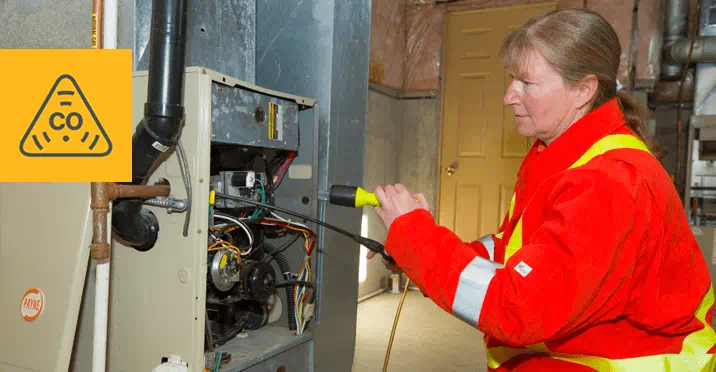 Gas technician working on a gas furnace