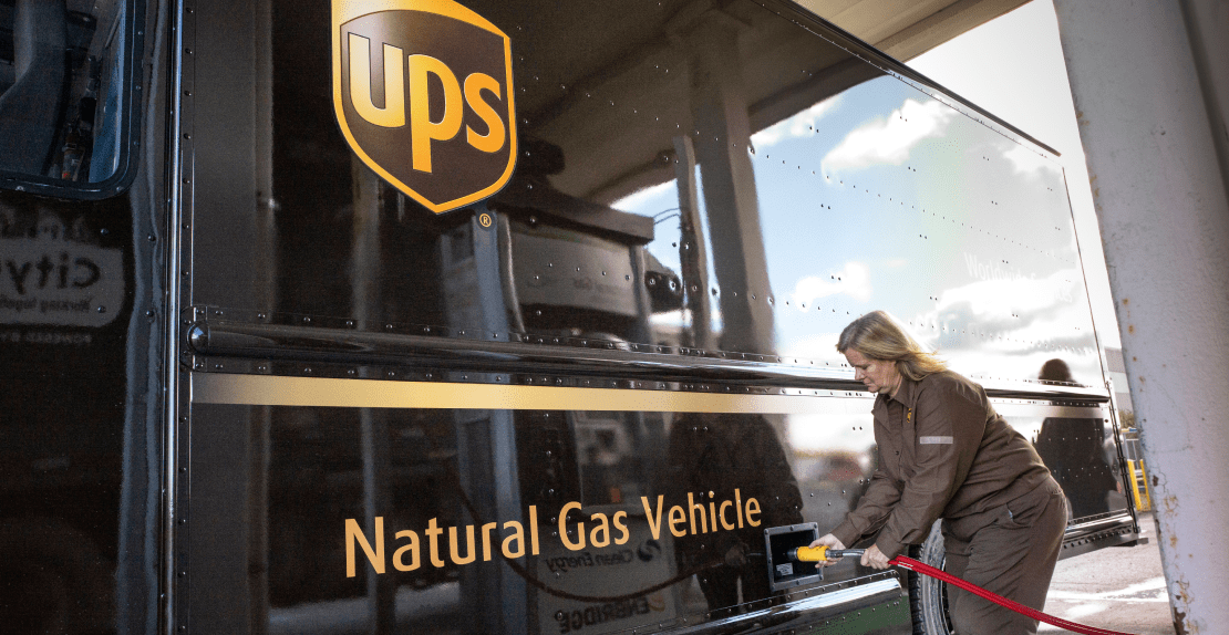 Person fuelling a CNG delivery truck