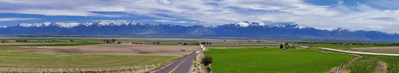 Tremonton and Logan Valley landscape views from Highway 30 pass, including Fielding, Beaverdam, Riverside and Collinston towns, by Utah State University, in Cache County along the Wasatch Front Range