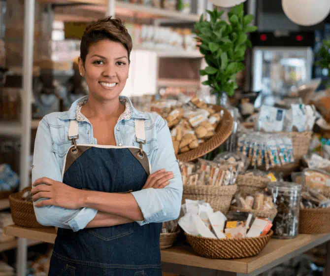 Woman working at a grocery store.