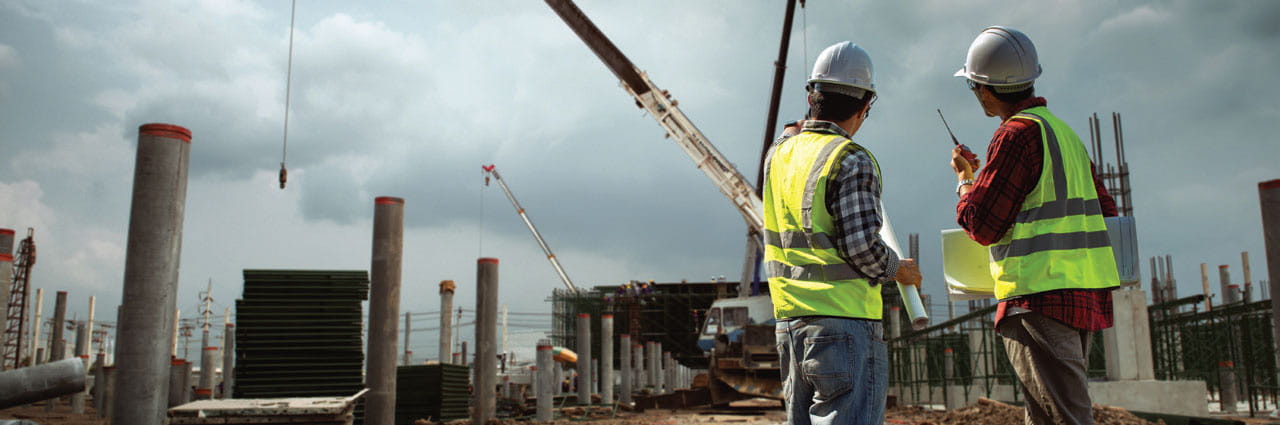 Two construction managers on a worksite