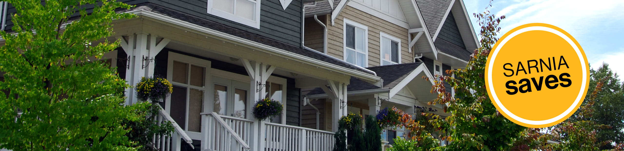 Residential houses and Sarnia Saves icon