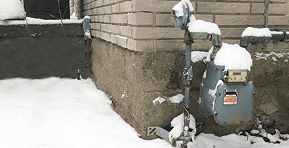 Natural Gas meter covered in snow