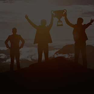 People holding a trophy showing the concept of achievement and success.